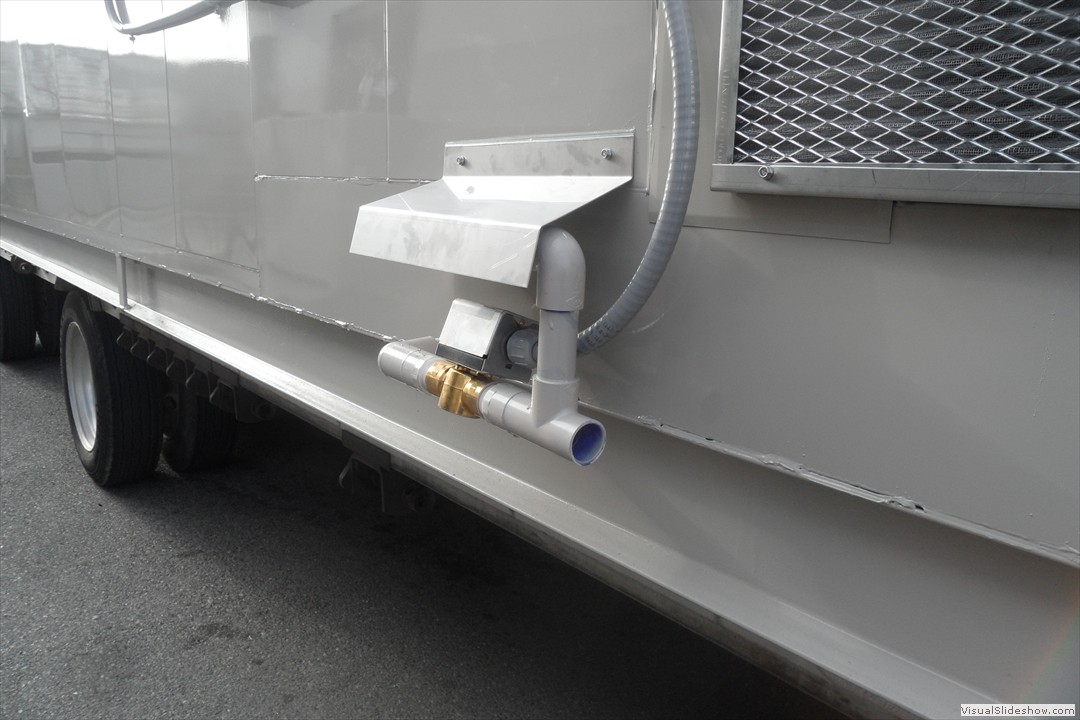 Water intake and dump valves are all covered by a small hood for protection from the outside environment.